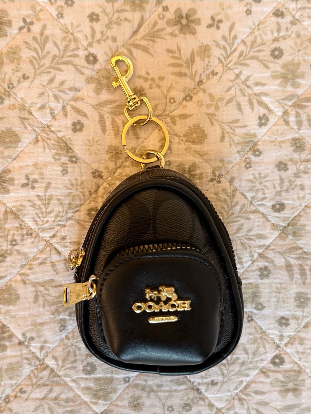 Coach mini court backpack bag charm in black with gold hardware